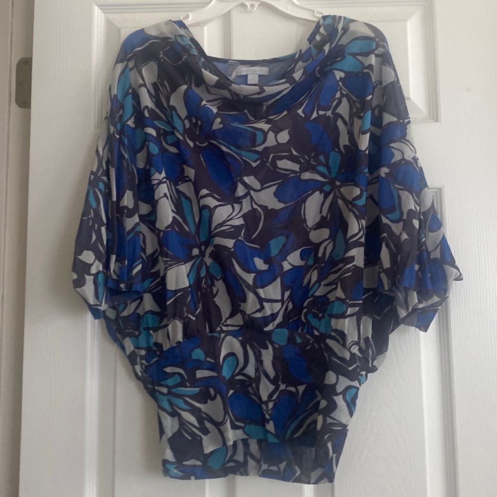 Sheer patterned blouse with banded waist and butterfly style sleeves